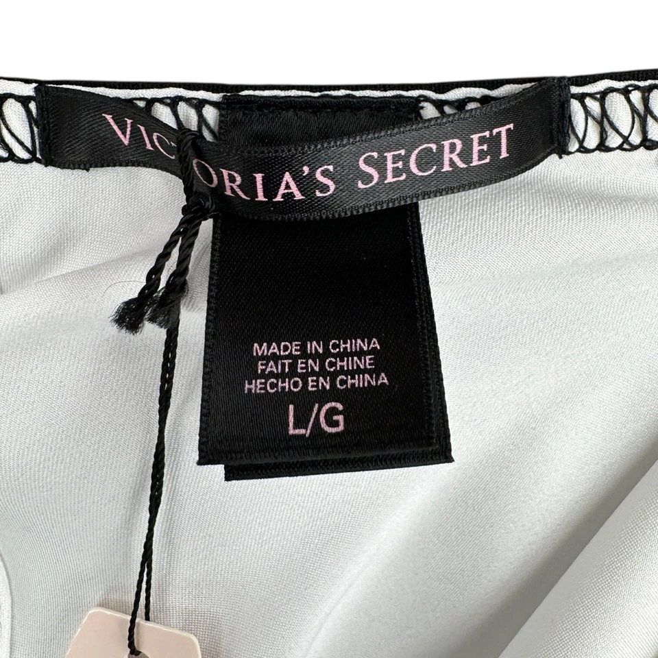 Camisola grande Victorias Secret blanca satinada negra con correas de espagueti lazo Foto 4 de 4