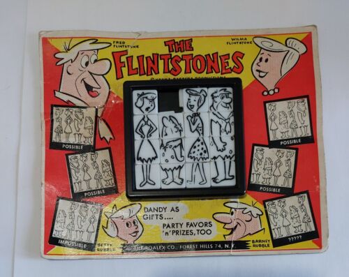 Flintstones slide dexterity Roalex puzzle on card