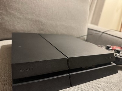 Sony PlayStation 4 500GB Black Home Console with Two Games and Controllers