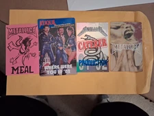 3- Metallica Backstage passes and 1 meal pass