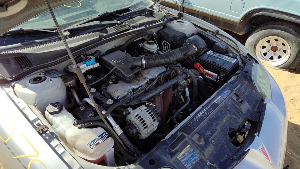 Pontiac Sunfire 2002 conductor conjunto de nudillo trasero izquierdo eje original con buje Foto 2 de 4