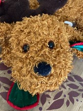 Dan Dees Santas Magic helper dog light brown long nap