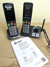 AT T SET - 2 BLACK CORDLESS LANDLINE TELEPHONES w ANSWERING MACHINE  GUIDEBOOK