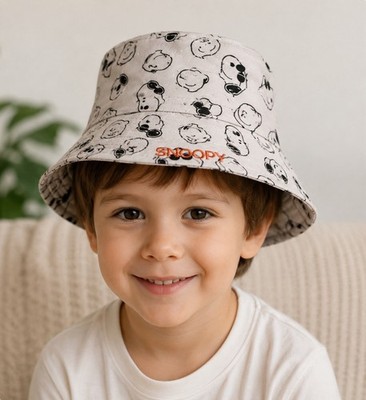 a Zara Kids beige cotton bucket hat featuring an all-over print of Snoopy faces