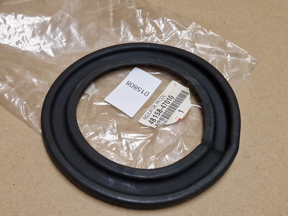 Montaje de goma de resorte helicoidal delantero Toyota Corolla E120 E130 48158-47010 genuino NUEVO Foto 2 de 4