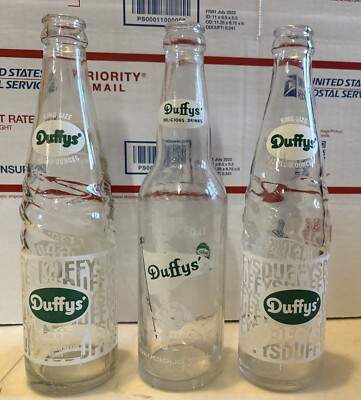 Three Duffy's Soda Bottles.