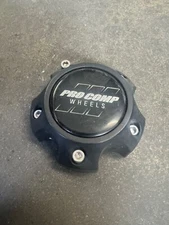 Pro Comp Aftermarket center cap, part # 6031cap2 (B10682)