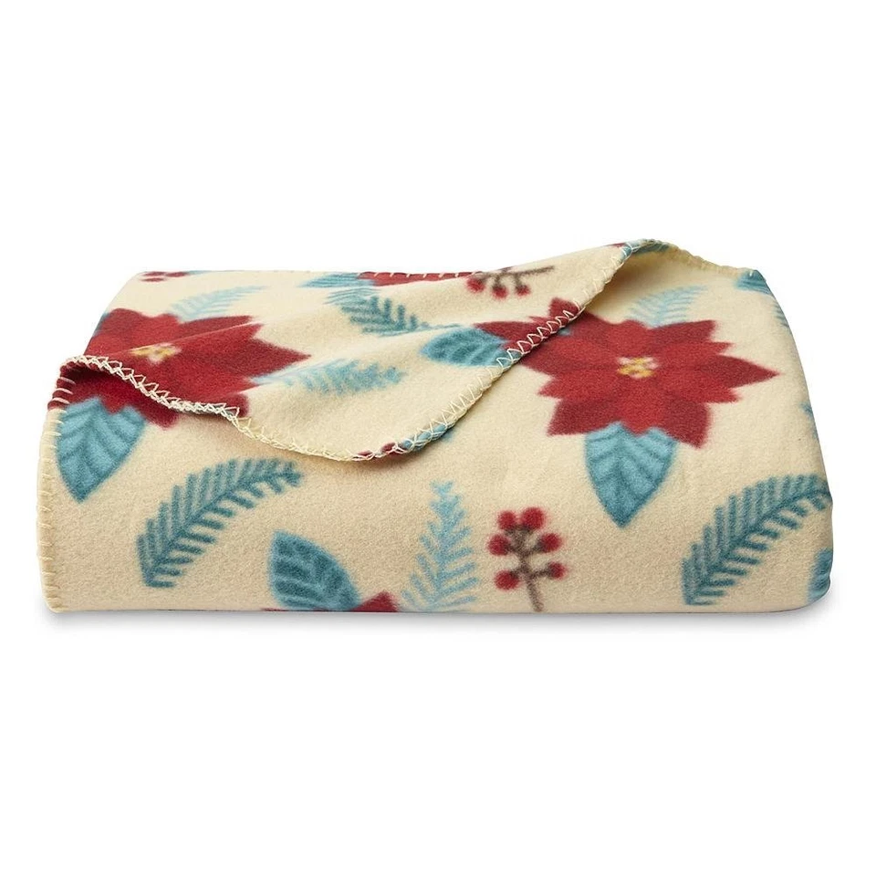 Manta polar Essential Home Navidad vacaciones roja/multi flor de pascua Foto 2 de 4