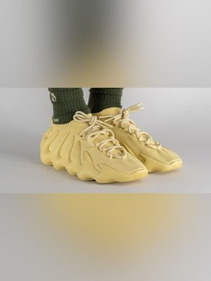 Adidas Yeezy 450 in Sulfur - silhouette is one-piece and exoskeleton-like 12
