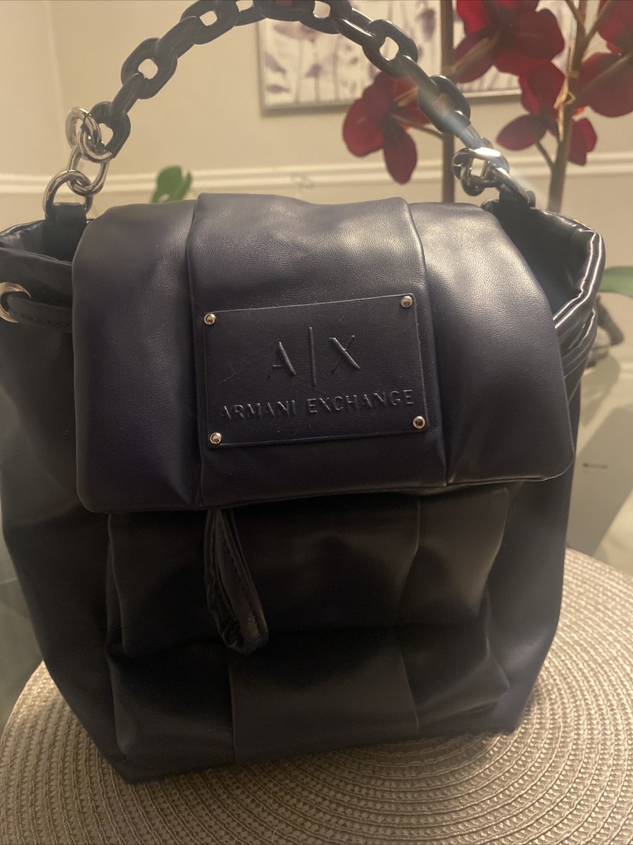 armani exchange backpack leather Black Rucksack Women Pockets The minimalist design focuses on functionality without excessive detailing Armani Exchange Black Leather Backpack