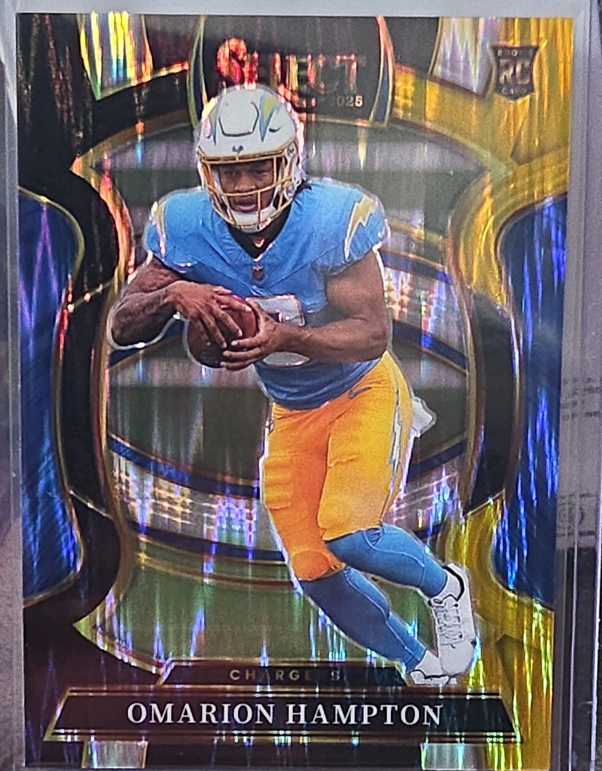 2025 Panini Select - Concourse Omarion Hampton #2 Black & Gold Shock Prizm (RC)