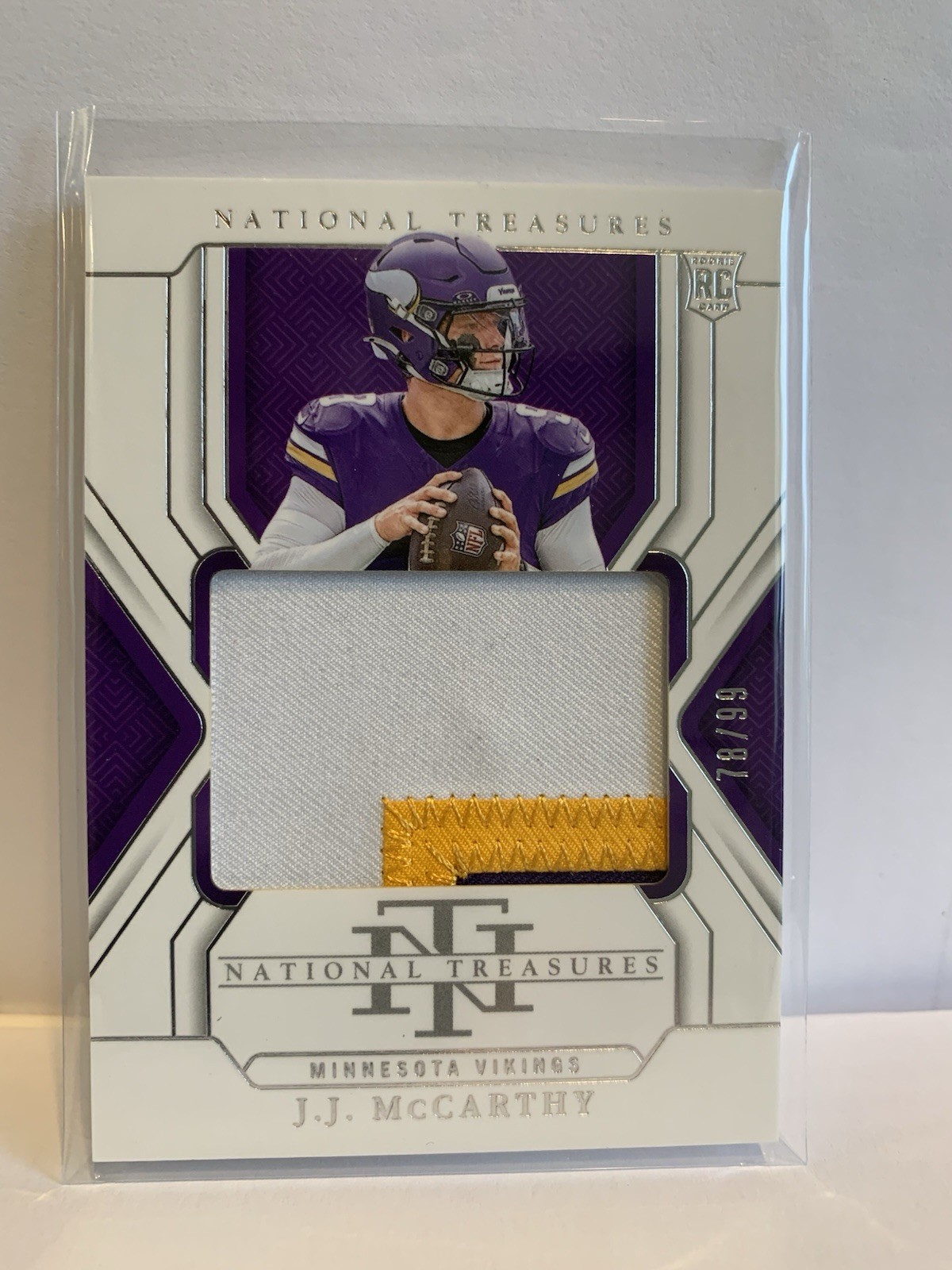 2024 Panini National Treasures - Rookie Patches J.J. McCarthy #214 /99 (MEM, RC)