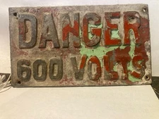 CAST ANTIQUE VINTAGE FROM SKELLY  REFINERY  600 VOLTS