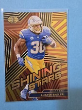 2023 Panini Illusions - Shining Stars Austin Ekeler #1 Black /50