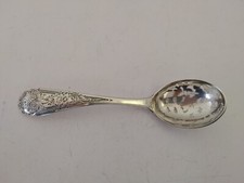 A Dutch .833 silver sifer spoon with pierced bowl and engraved handle