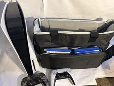 Sony PlayStation 5 Disc Edition with 5 games, two controllers and carry bag $400