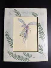 Framed  Greeting Card By Patience Brewster Illustrating a Fairy In A Furio Frame