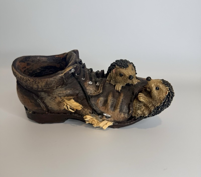 2 Hedgehogs In a Distressed Brown Boot Planter Made Of Resin By Bramble & Clover