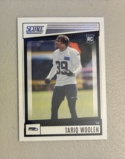 2022 Panini Score Tariq Woolen Rookie Football Card #390. rookie card picture