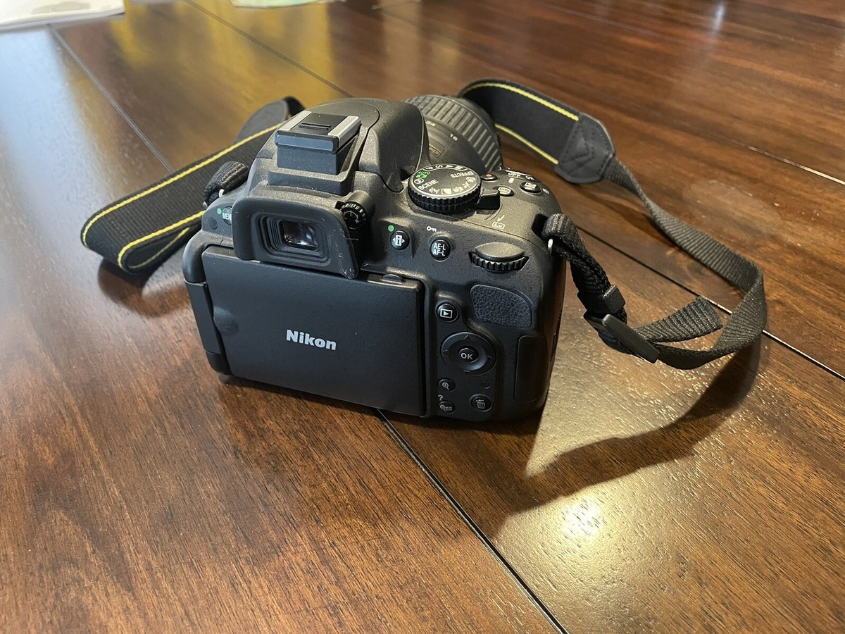 Nikon D5100 DSLR camera, 2 lenses, carry case, manuals, cables