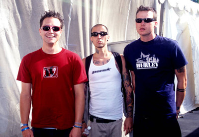 Mark Hoppus Travis Barker and Tom DeLonge of Blink 182 pose at Li- 1990s Photo