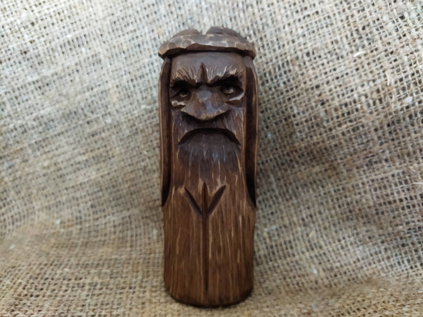 Kindle statue. Wooden Chur of the Slavic God. Wood carving Handmade-image