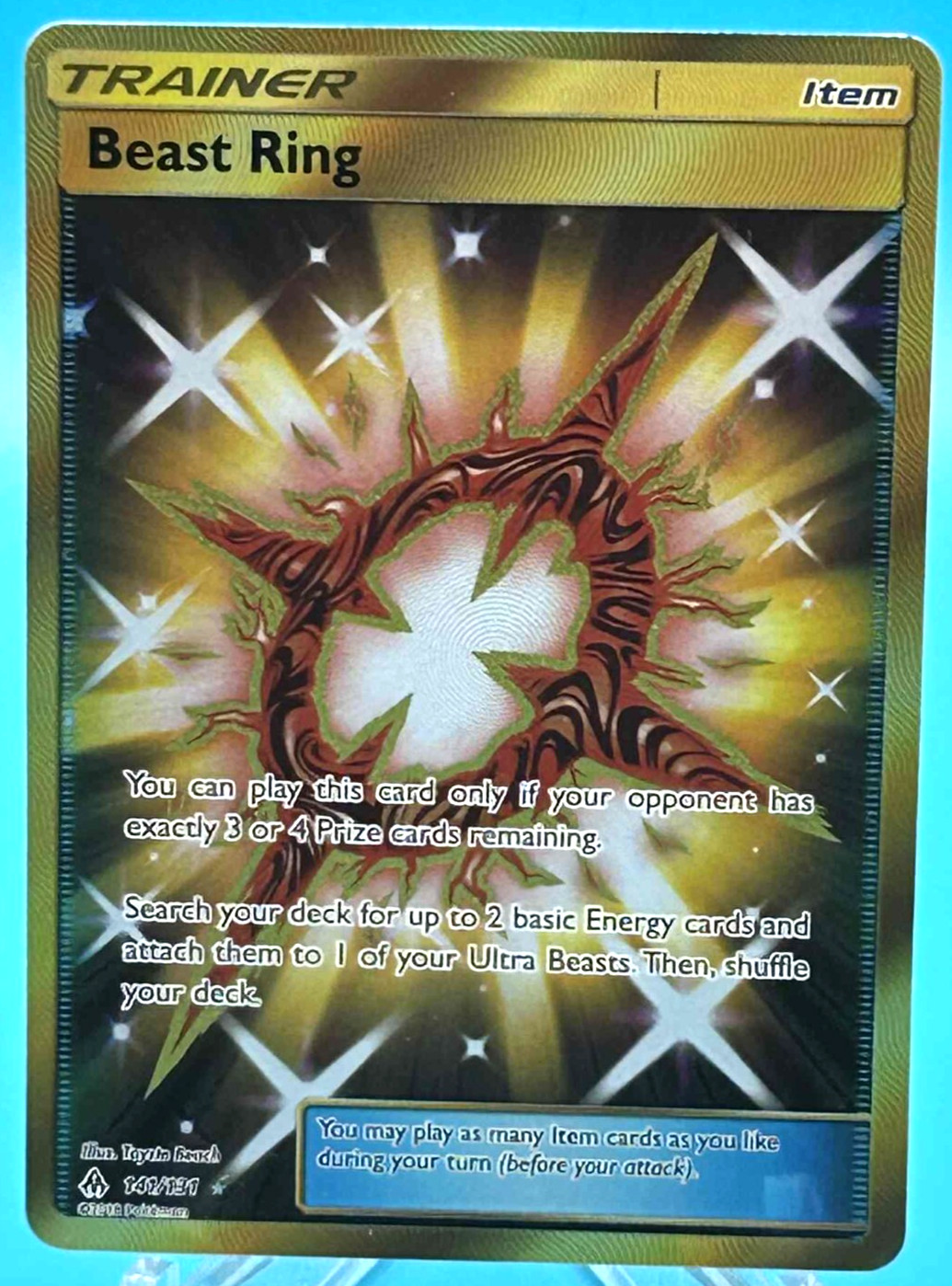 Beast Ring (141/131) Sun & Moon: Forbidden Light​ - Near Mint Holofoil Pokemon T