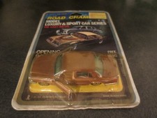 EARLY VINTAGE ROAD CHAMPS DIECAST - MERCEDES BENZ IN GOLD - MINT ON SEALED CARD