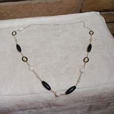 estate necklace. I am not a jeweler. so this is being sold as costume jewelry.