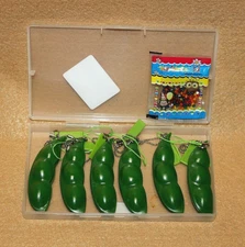6 Squeeze Pea Pod Beans Squishy Toy + Seven Color Crystal Boll + Plastic Case
