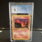 The Pokémon Company Charmander 50/82 Team Rocket 1st Ed Regular EN 2000 CGC 9