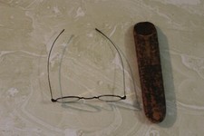 ANTIQUE PAIR OF FOLDING EYEGLASSES WITH CASE