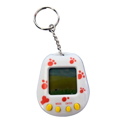 Manley Quest POCKET PUPPY PAWS Virtual Pet 1997 Electronic Game Keychain
