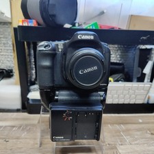 Canon EOS 10D With EF 35-80mm f4.5-6, BG-ED3 Grip, CB 5L charger and batteries.