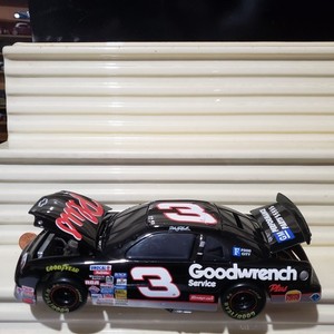 Action 1/24 #3 DALE EARNHARDT 1997 GM GOODWRENCH PLUS Chevy Monte Carlo BANK NIB