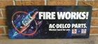 Vintage AC - Delco Parts, GM, Fire Works! Spark Plug Metal Sign 24" x 10"