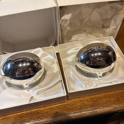 Two egg-shaped music boxes