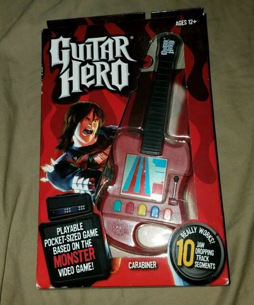 Guitar Hero 1 & 2 Carabiner Electronic Battery Game LCD 10 Tracks