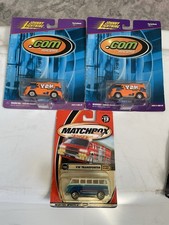 LOT OF 2 JOHNNY LIGHTNING VW .COM BUS WITH WHEEL VARIATION AND 1 MATCHBOX VW