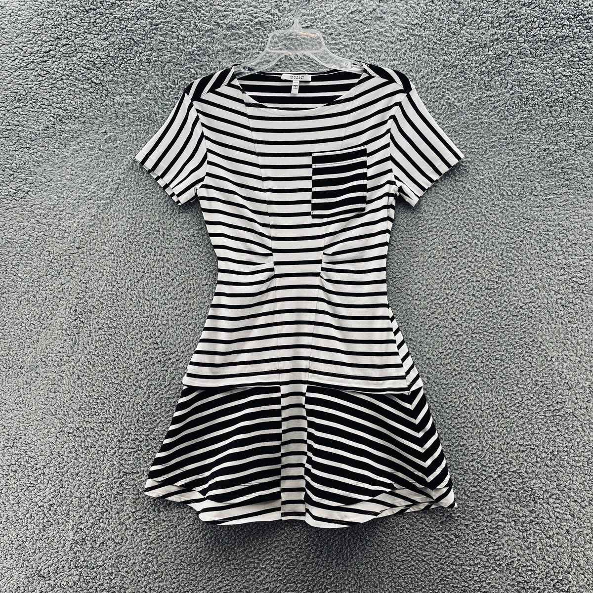 white dress with black horizontal stripes White Dress With Black Horizontal Stripes On Invisible Mannequin Cutout Stock Photo - Download Image Now