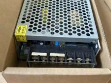 New In Box COSEL R100-24 Power Supply