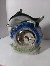 Dolphin 7" Tall Resin Quartz Bottle nose  Dolphin's Swimming Around the Clock
