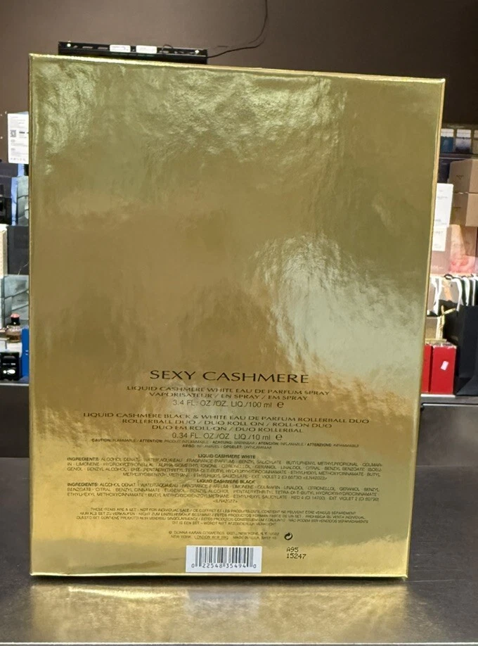 JUEGO DE REGALO DONNA KARAN CACHEMIR LÍQUIDO BLANCO CON EAU DE PARFUM SPRAY 100 ML NUEVO EN CAJA Foto 2 de 3