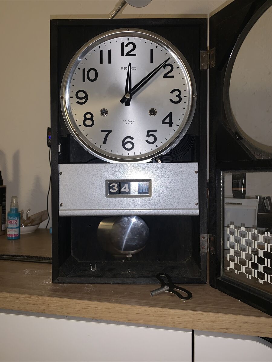 Vintage Seiko Time Date wall clock, chiming, day/date, 1970s