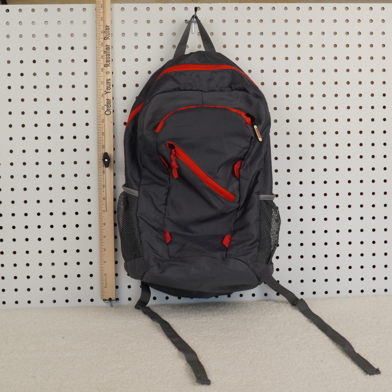 Costco Backpack Gray Red Shoulder Straps Water Bottle Side Pockets Zip Logo