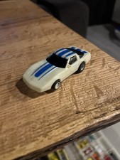 TYCO HO SLOT CAR CORVETTE GLOW IN THE DARK, BLUE STRIPES-Running-