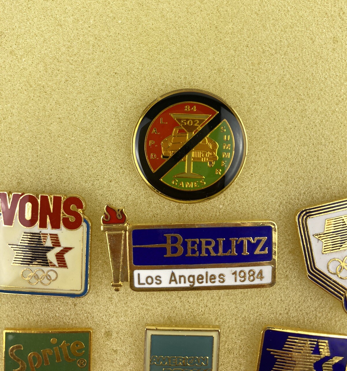 1984 Los Angeles Olympics pins Set of 7, LAPD, Sprite, 7-11, Amex, Vons, Conroys