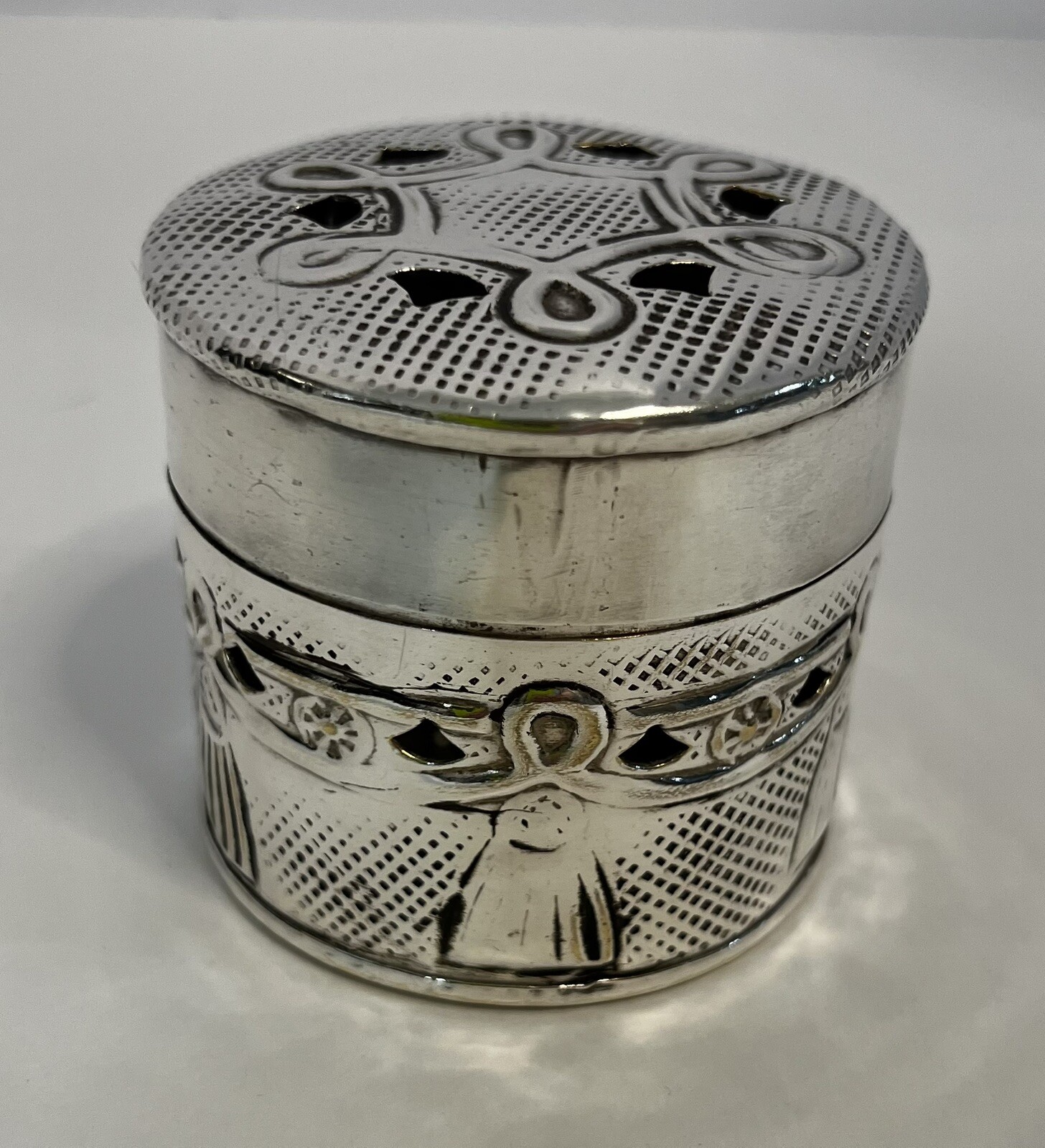 Vintage silver tone round jewelry box with plated trinket container-image