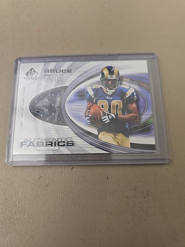 2004 ISAAC BRUCE SP GAME USED JERSEY CARD. STL.RAMS.