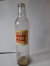 Shell X100 quart oil bottle. Esso. Mobil. Shell. BP. empty shell bottle